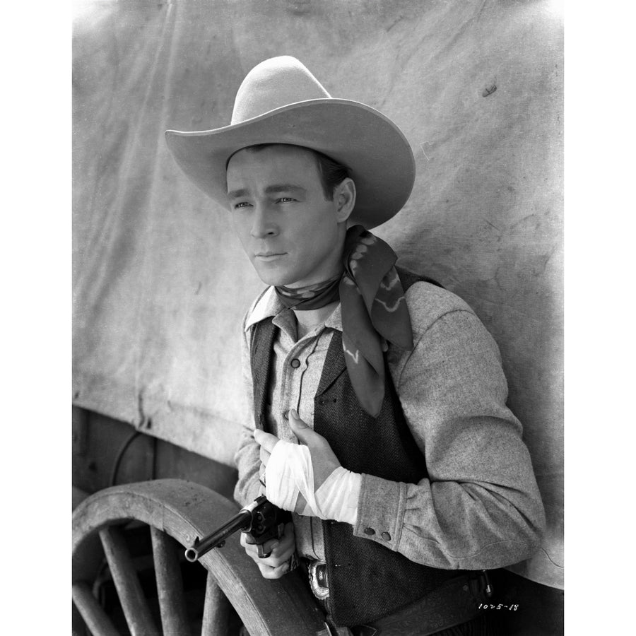 Roy Rogers posed in Cowboy Outfit with Gun in Black and White Photo Print Image 1