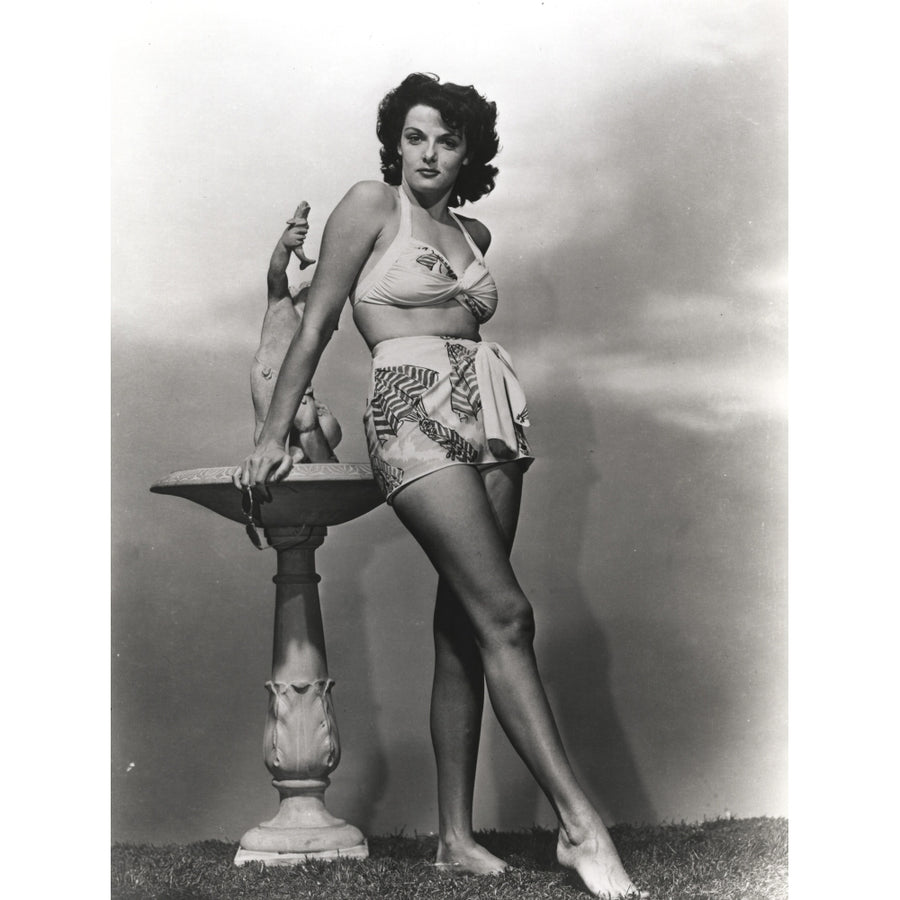 Jane Russell Posed in White Silk Two Piece Swimsuit while standing Beside a Marble Figure Photo Print Image 1