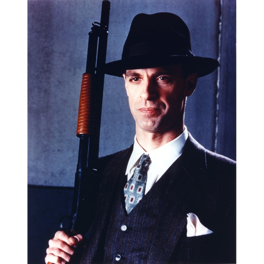 Keith Carradine Posed in Suit with Gun Photo Print Image 1