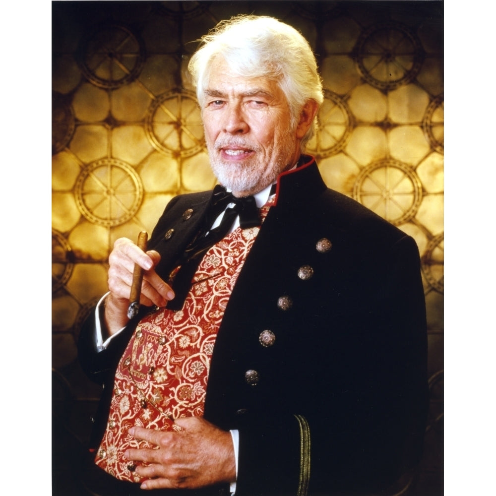 James Coburn Portrait in Black Velvet Suit and Brown Shiny Silk Shirt with Black Bow Tie with Right Hand Holding a Small Image 1