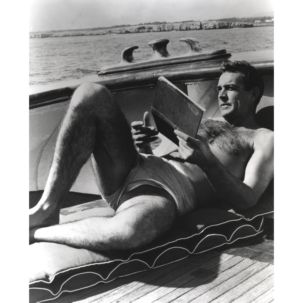 Sean Connery sunbathing with a notebook Photo Print Image 1