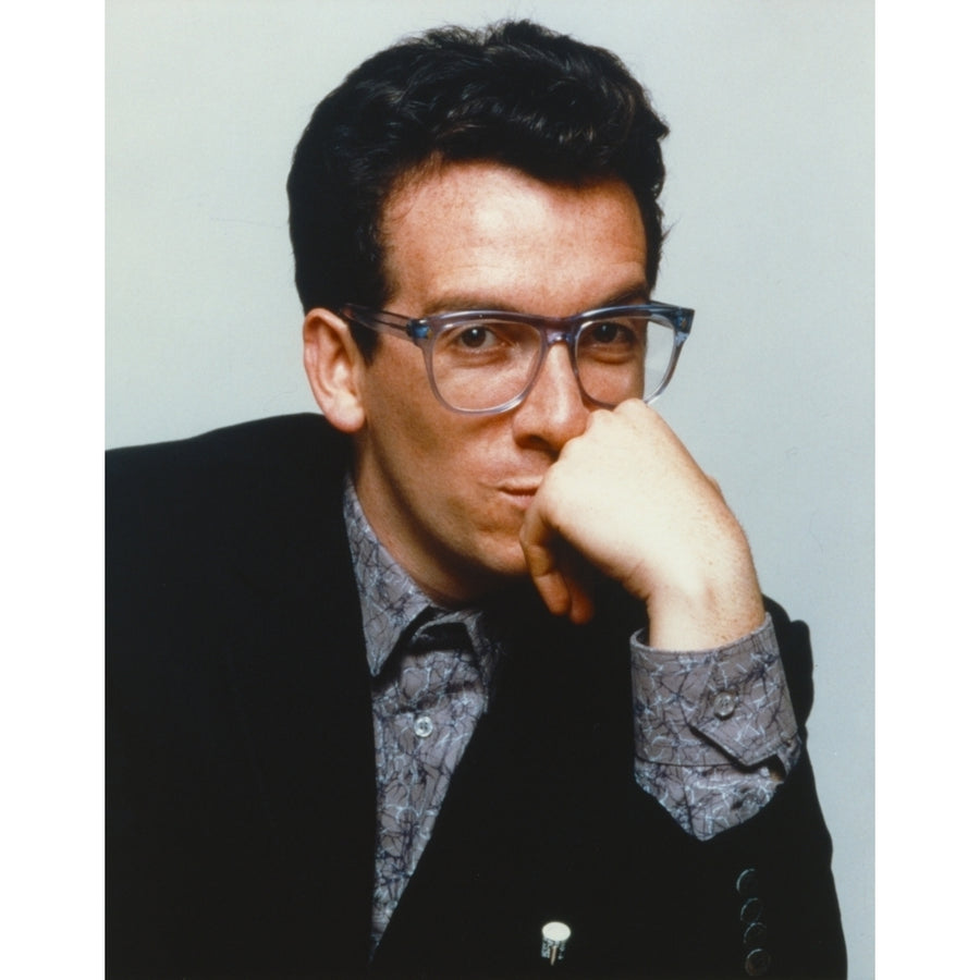 Elvis Costello Leaning Chin On Hand in Black Tuxedo Photo Print Image 1