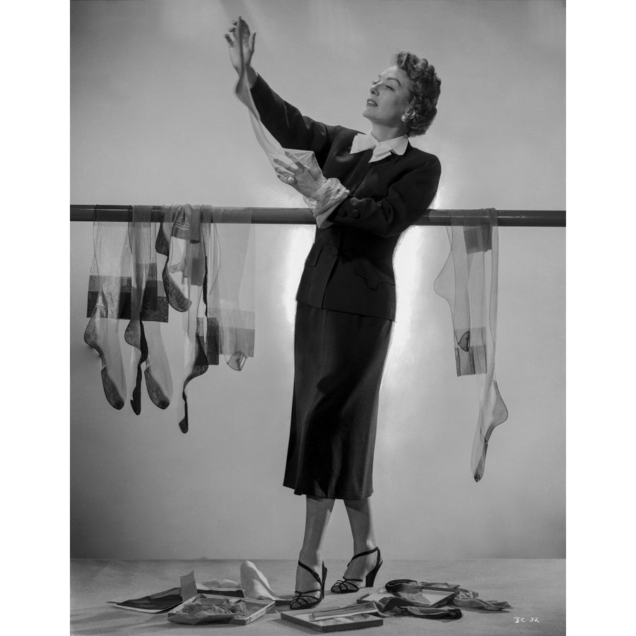 Joan Crawford Holding Her Stockings in a Classic Portrait Photo Print Image 1