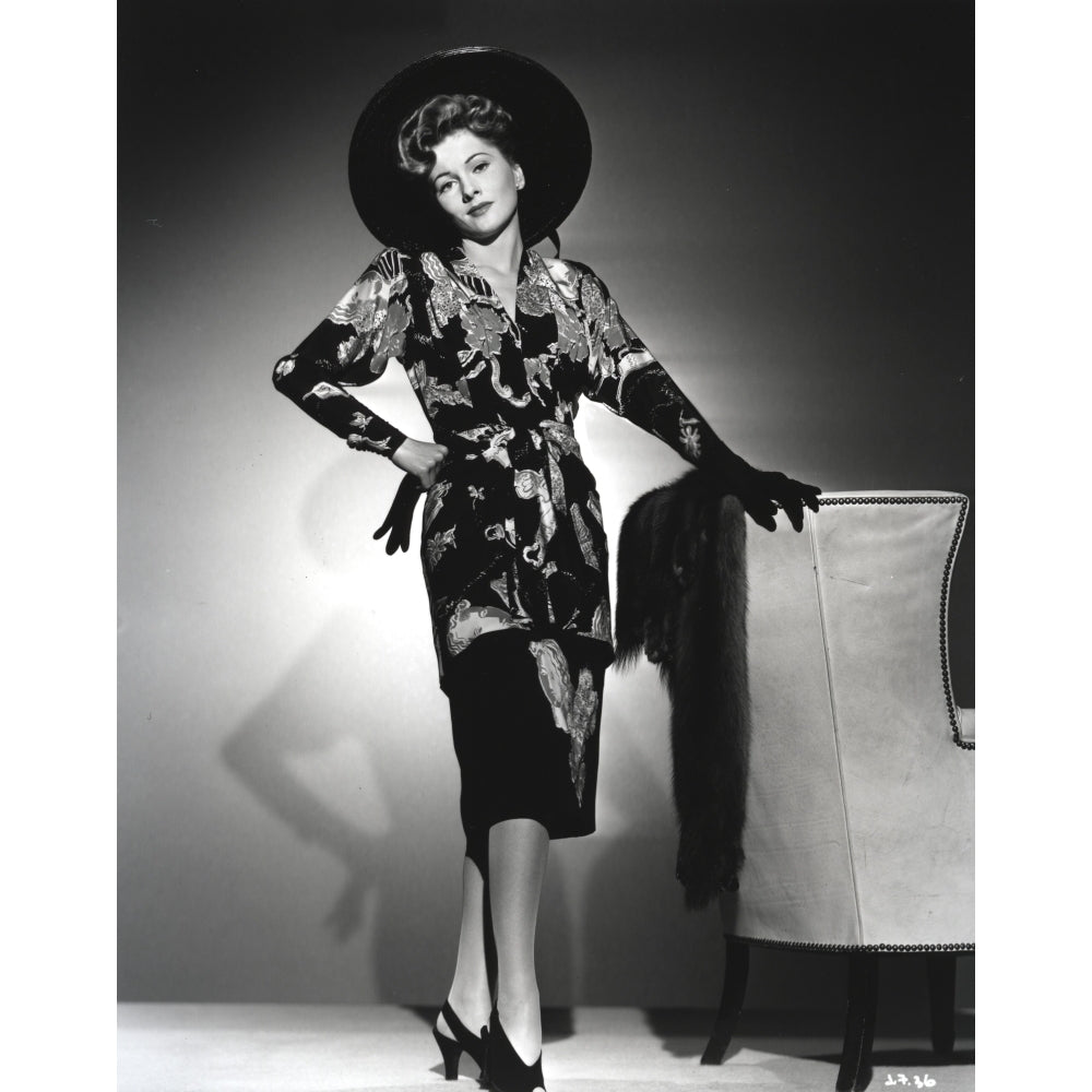 Joan Fontaine wearing a Floral Dress with Black Gloves Photo Print Image 1