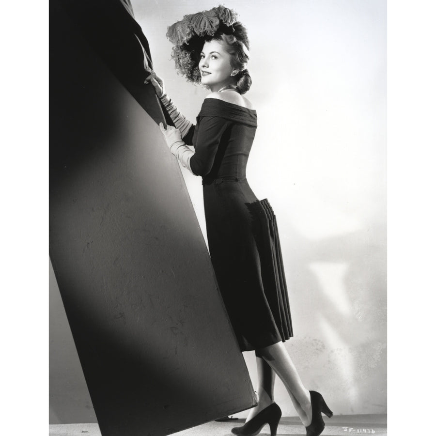 Joan Fontaine Leaning and smiling wearing Black Gown Photo Print Image 1