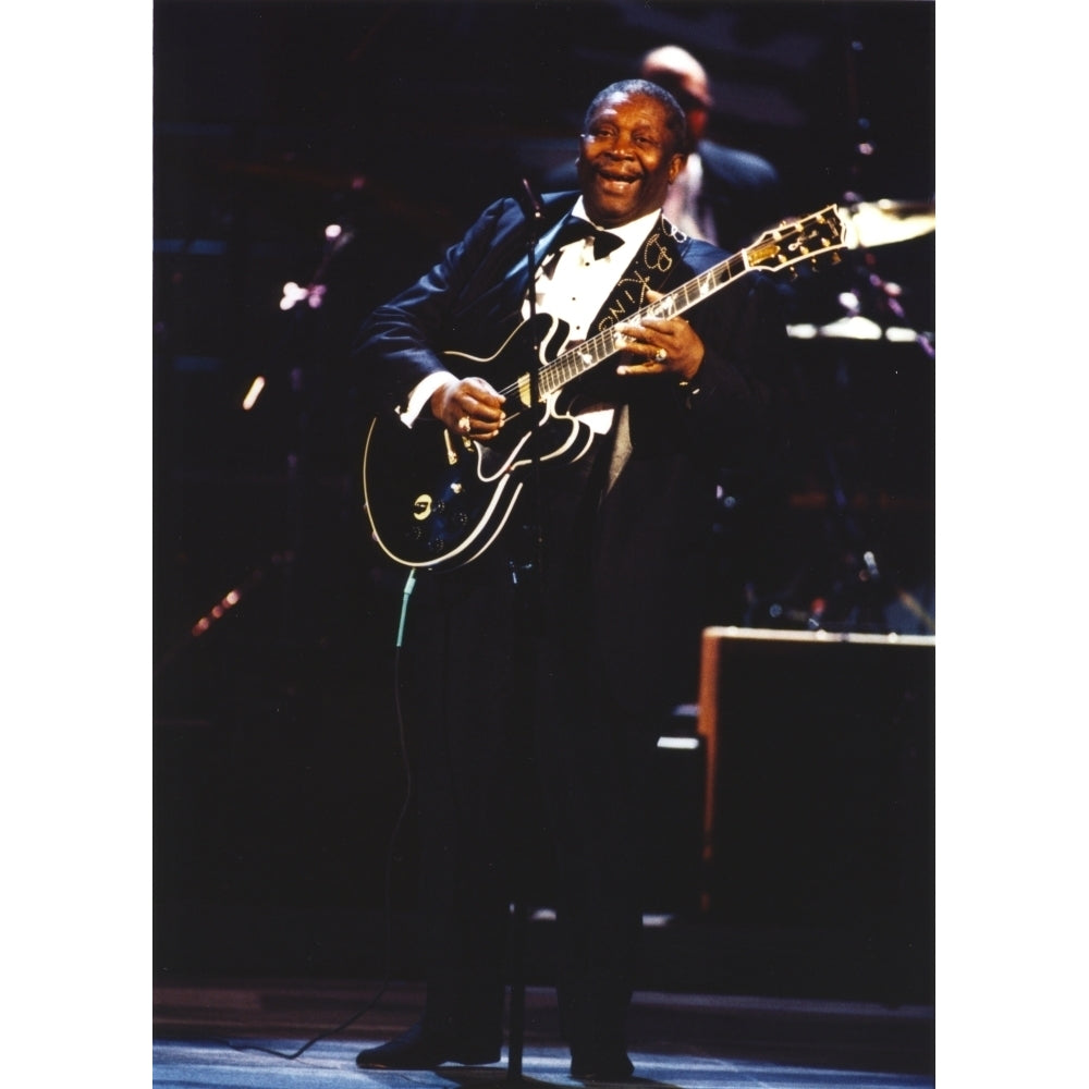 BB King Performing on Stage using Black Les Paul Guitar in Black Suit and Bow Tie Photo Print Image 1