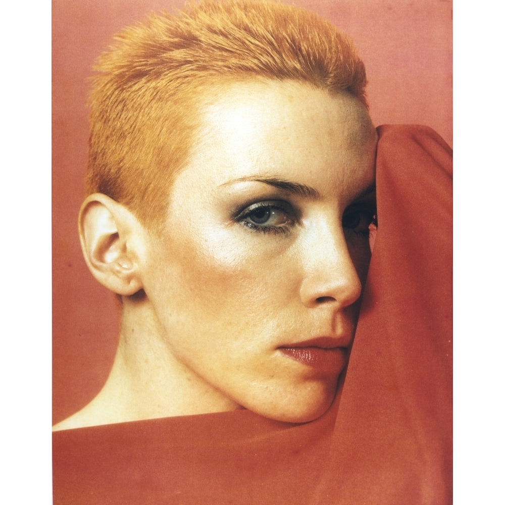 Annie Lennox posed in Close Up in Red Background Photo Print Image 1