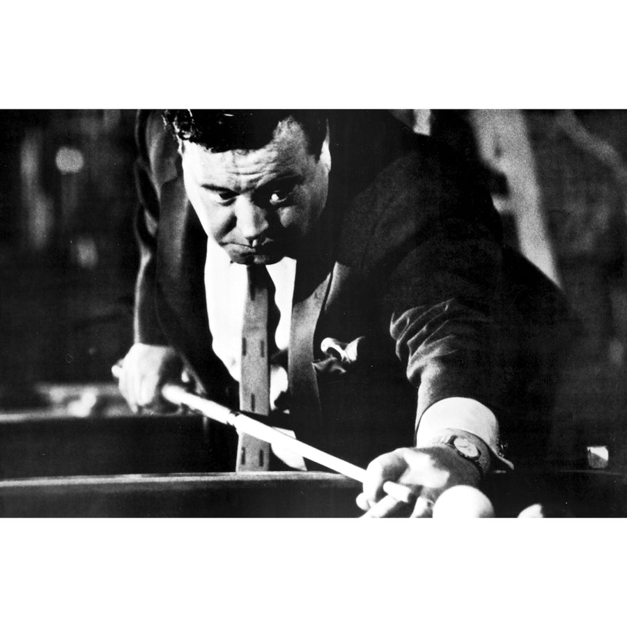 A film still of Jackie Gleason shooting pool Photo Print Image 1