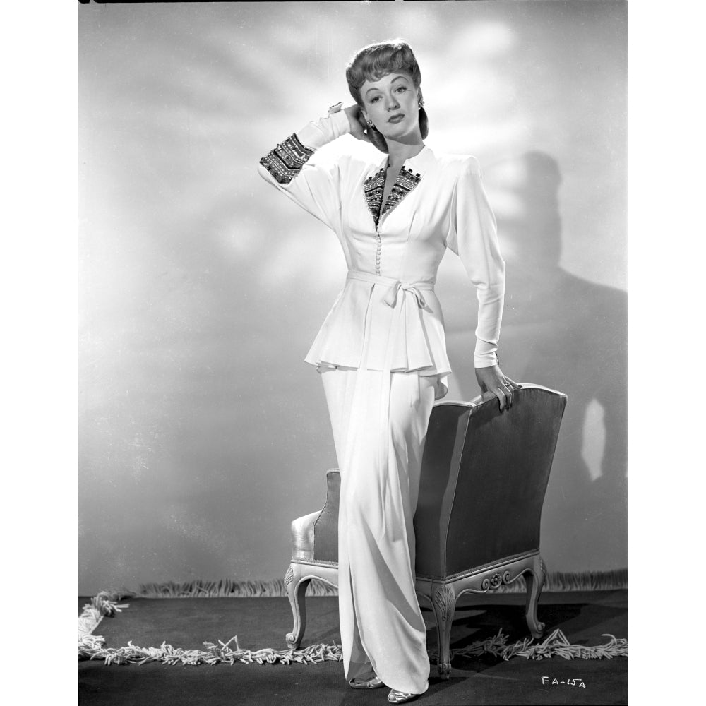 Eve Arden standing in Long Sleeve Blouse Photo Print Image 1