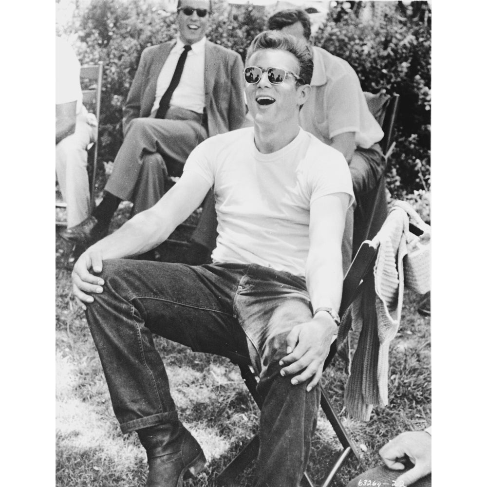 James Dean Seated on a Small Chair in White Round Neck T-Shirt with Hands on the Knees Photo Print Image 1