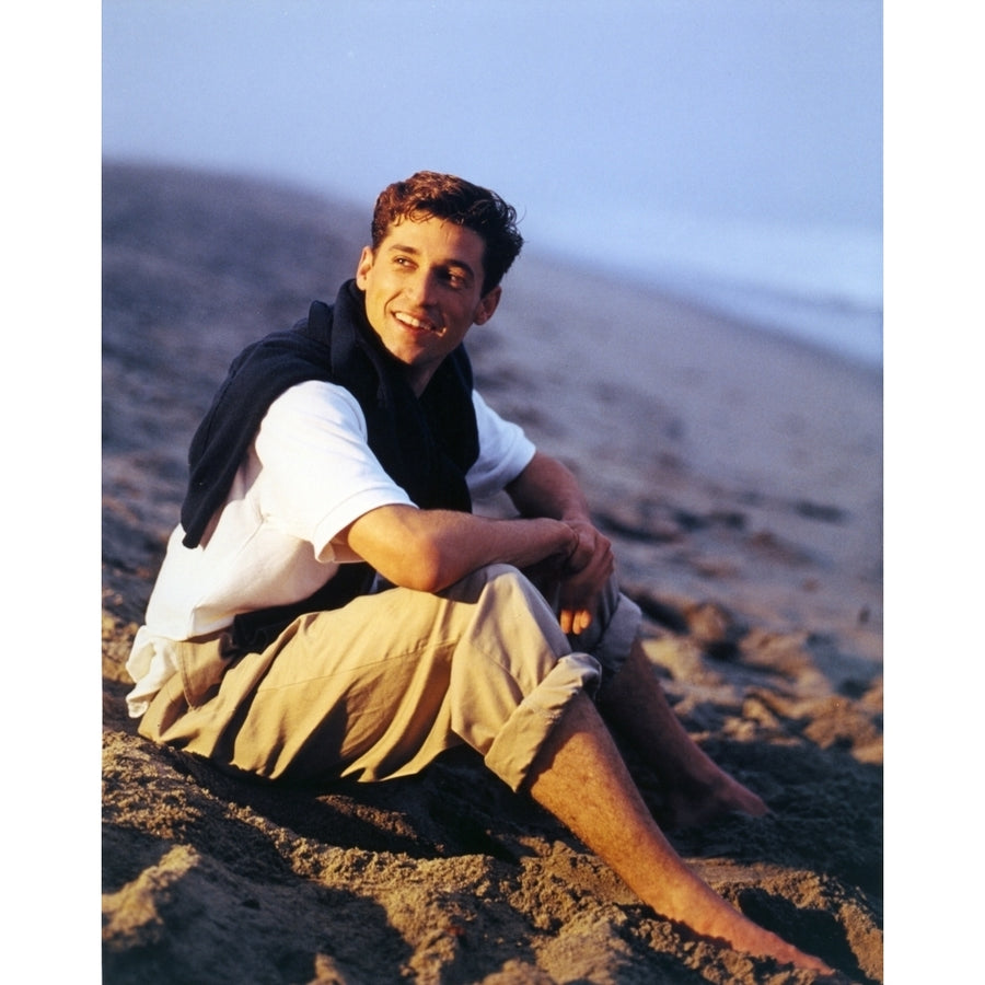 Patrick Dempsey sitting on Mountain Photo Print Image 1