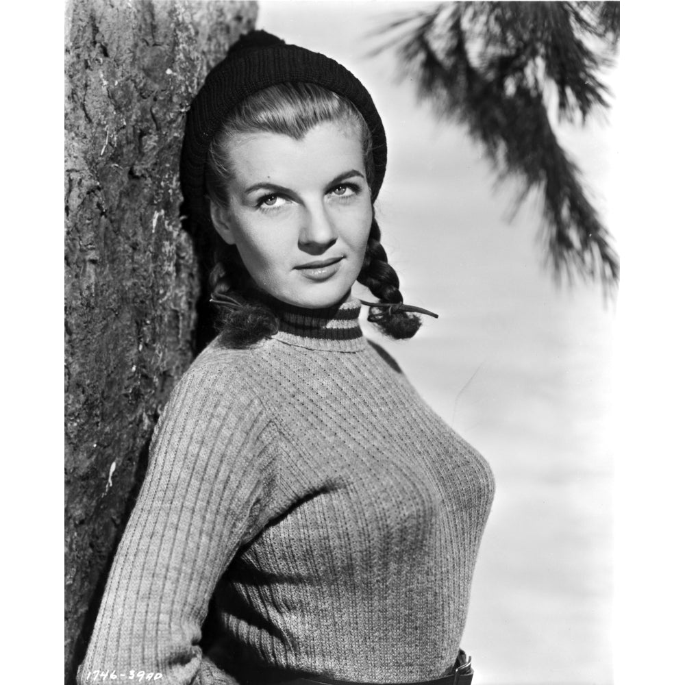 Corinne Calvet Leaning on Tree wearing Sweater Photo Print Image 1