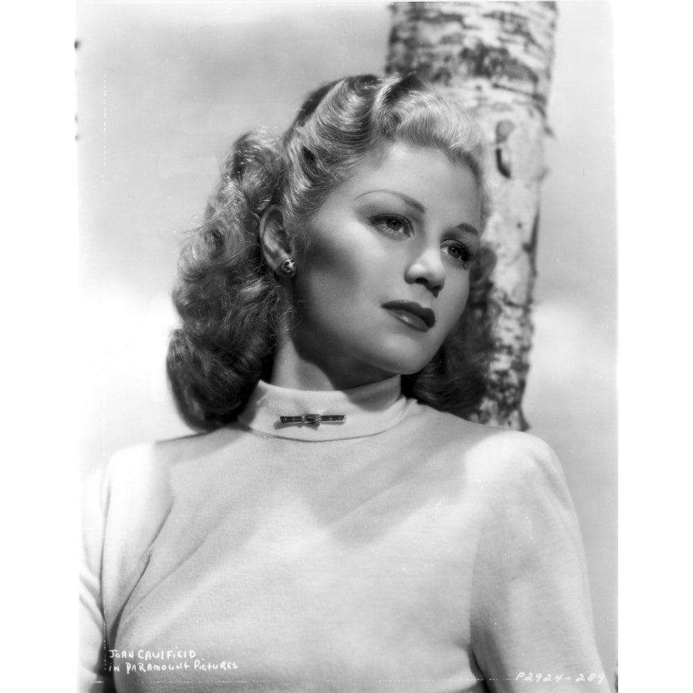 Joan Caulfield Leaning on a Tree while Looking Away in a Classic Portrait Photo Print Image 1