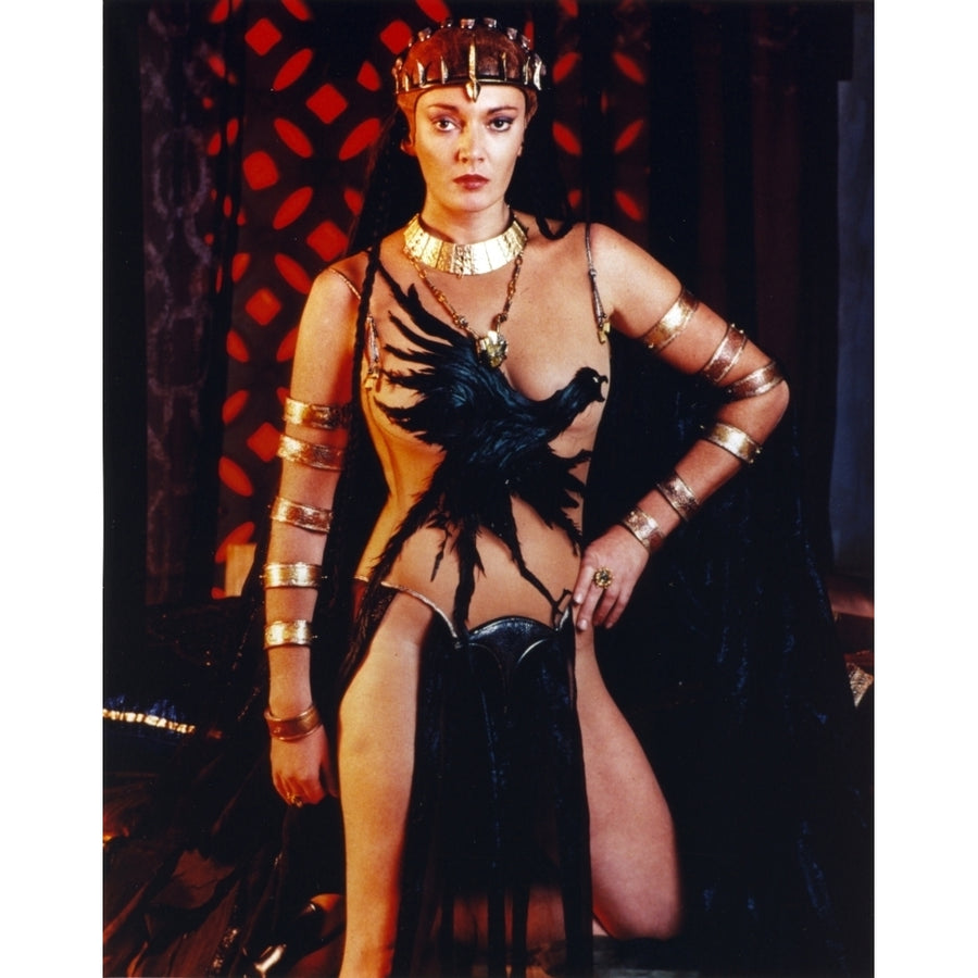 Sarah Douglas Posed in Crow Printer Dress with Gold Bracelets Photo Print Image 1