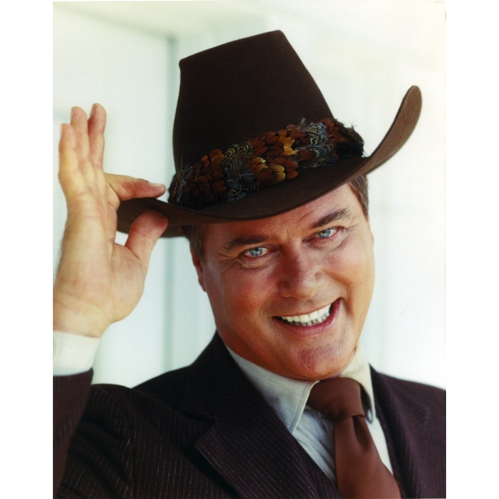 Larry Hagman smiling in Brown Coat Photo Print Image 1