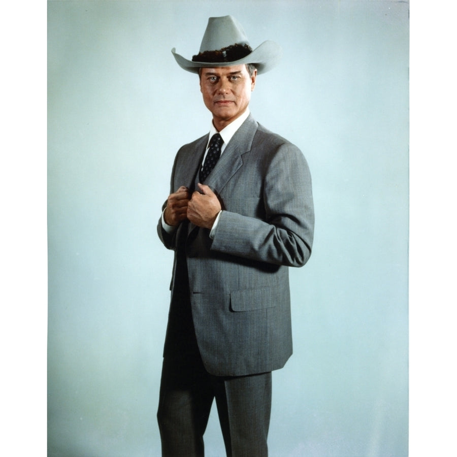 Larry Hagman Posed in Grey Coat with Cowboy Hat Photo Print Image 1