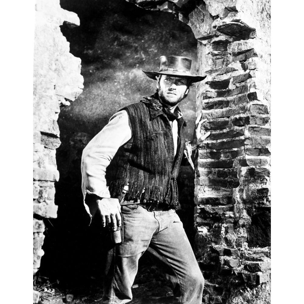 Clint Eastwood standing in Movie Scene wearing Cowboy Attire Photo Print Image 1