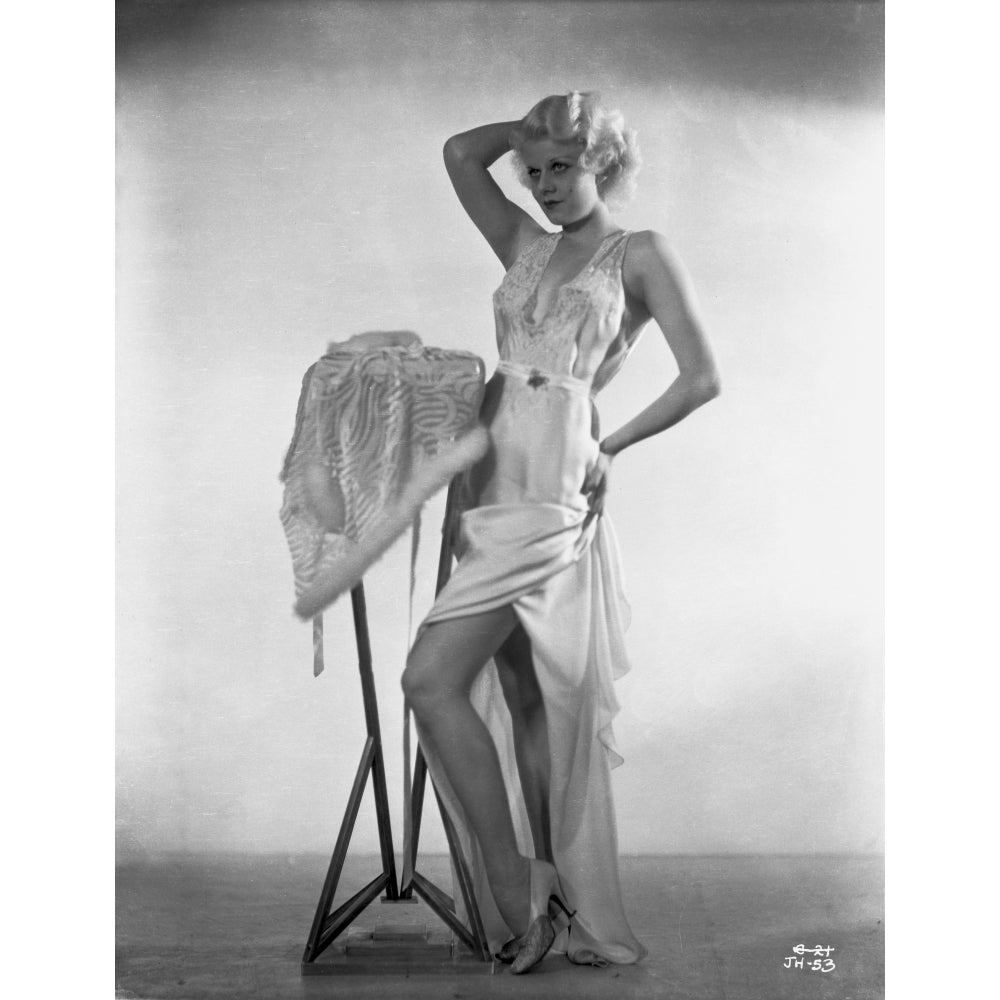 Jean Harlow Posed in White Silk Dress and Silk Slit Ruffled Skirt with Right Hand on the Head Photo Print Image 1