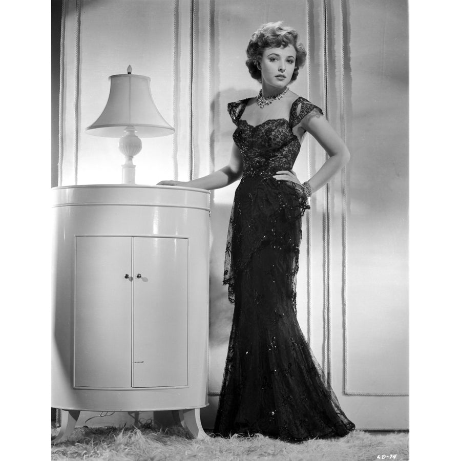 Laraine Day posed wearing Black Dress in Black and White Photo Print Image 1