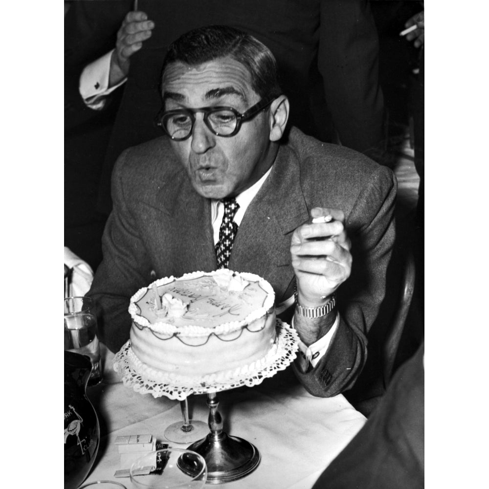 Irving Berlin blowing candles Photo Print Image 1