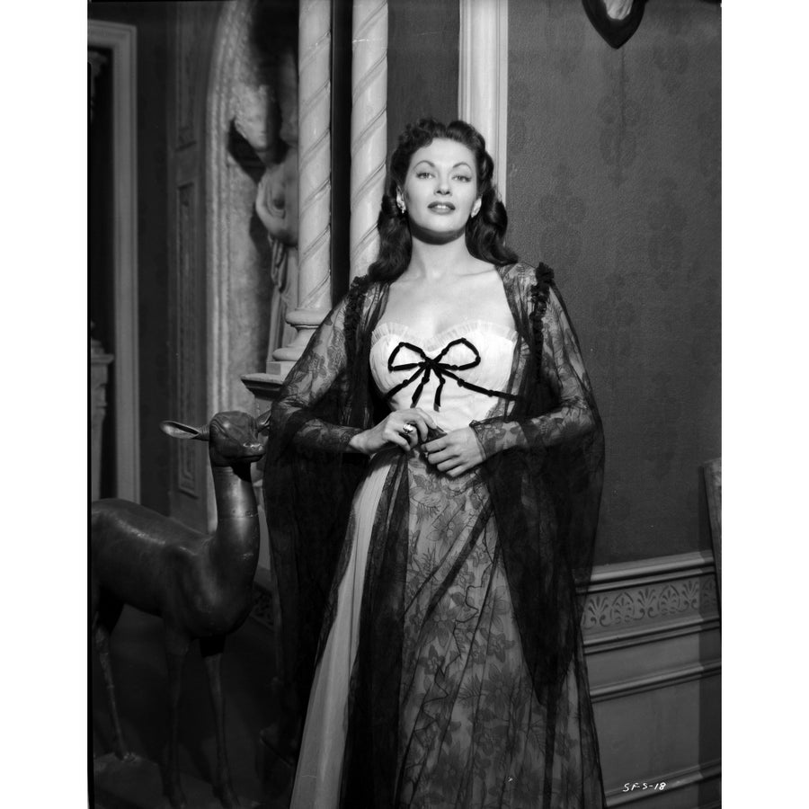 Yvonne Decarlo standing in Classic Gown with White Corset Photo Print Image 1