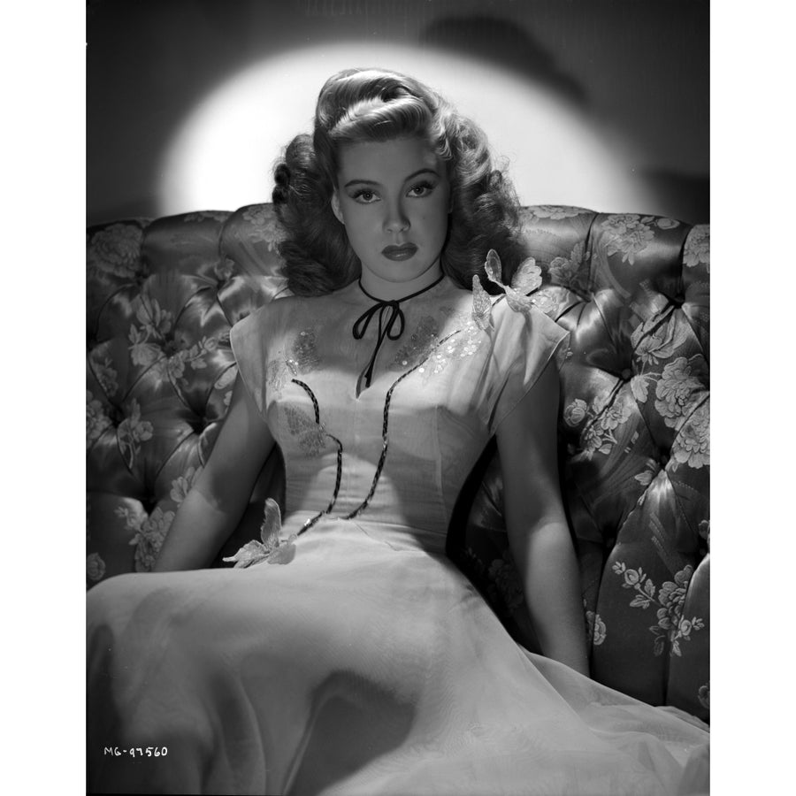 Gloria DeHaven sitting On A Couch in Gown in Black and White Photo Print Image 1