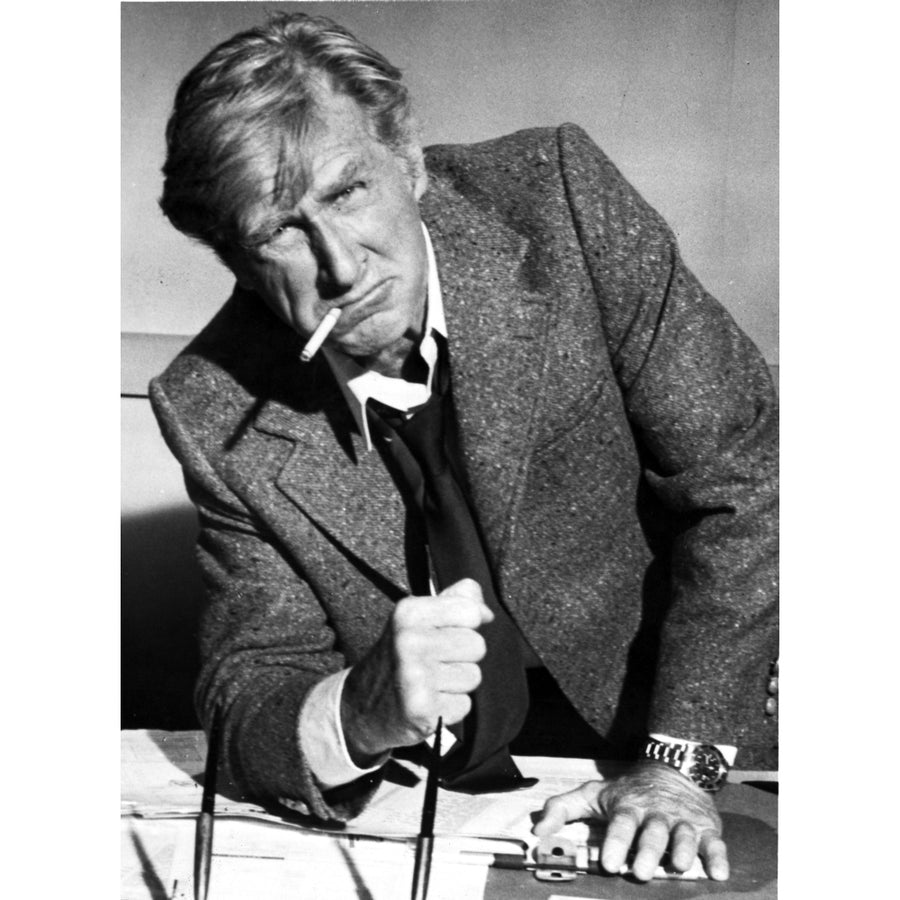 Lloyd Bridges leaning on a desk Photo Print Image 1