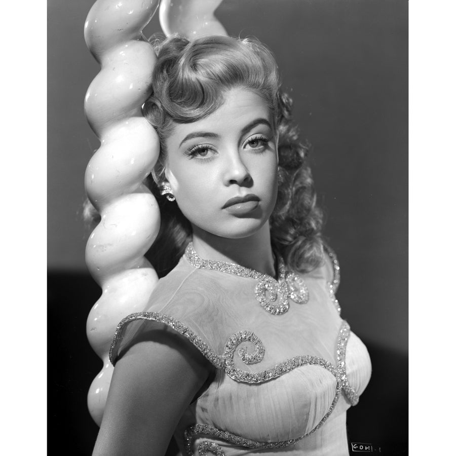 Gloria DeHaven Leaning On A Pole in Fancy Dress in Black and White Photo Print Image 1