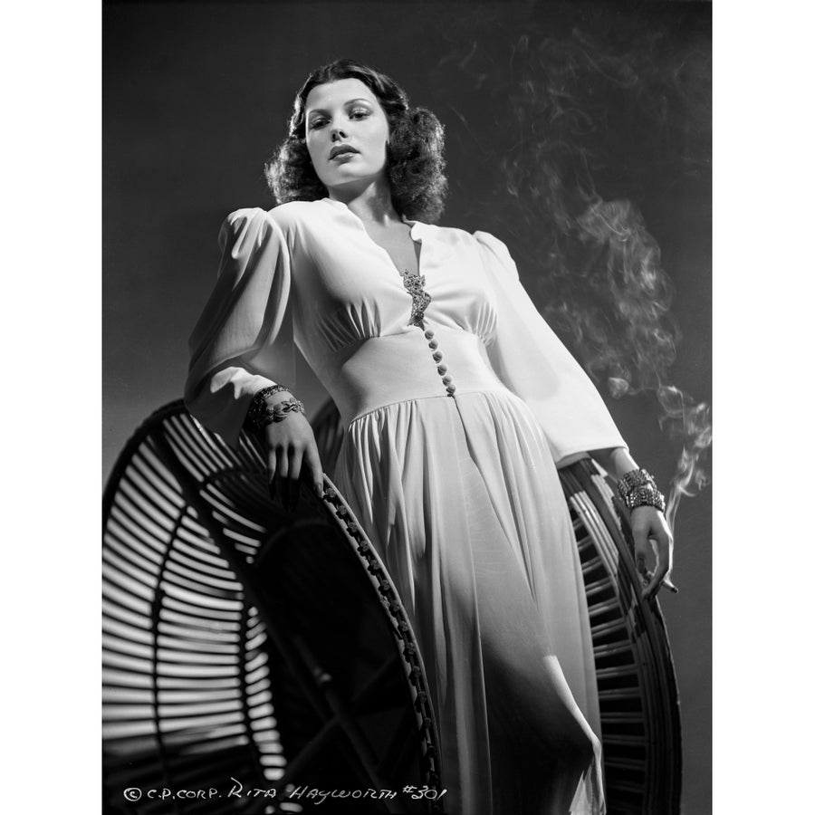 Rita Hayworth Leaning and Smoking Pose Photo Print Image 1