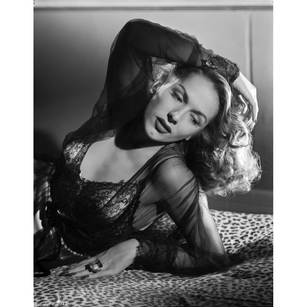 Jinx Falkenburg on an Embroidered Lace Top Lying on Leopard Cloth Photo Print Image 1