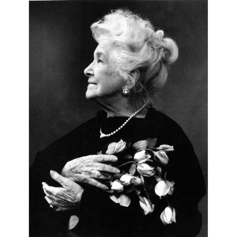 A portrait of Helen Hayes carrying roses Photo Print Image 1