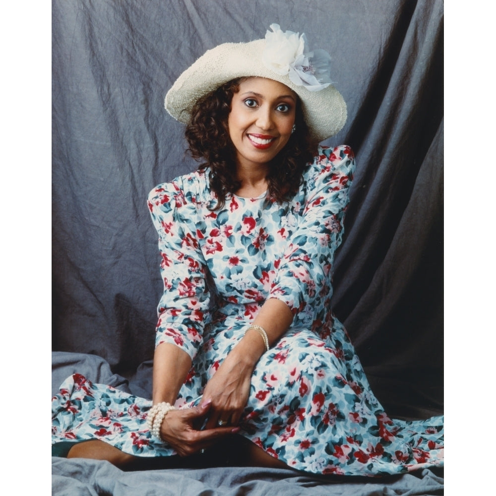 Portrait of Telma Hopkins posed in Floral Dress with Hat Photo Print Image 1