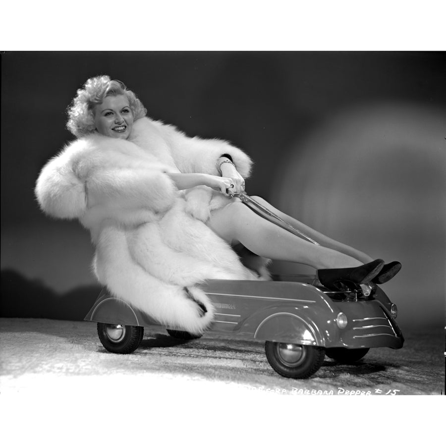 Barbara Pepper on a Furry Coat sitting and Playing Photo Print Image 1