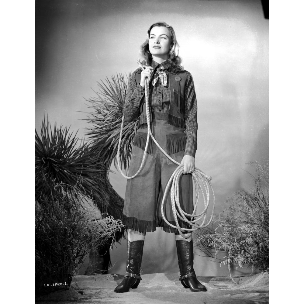 Ella Raines Holding Rope in Cowboy Attire Photo Print Image 1