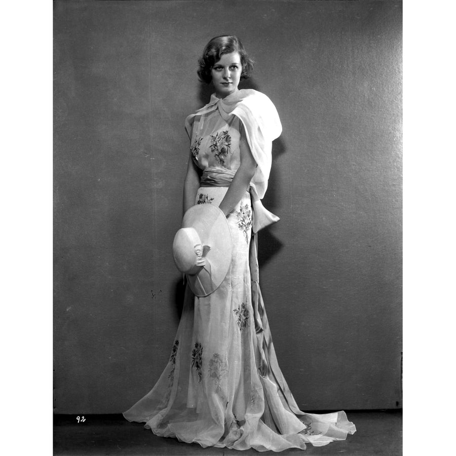 Margaret Sullivan standing in White Gown with Hat Photo Print Image 1