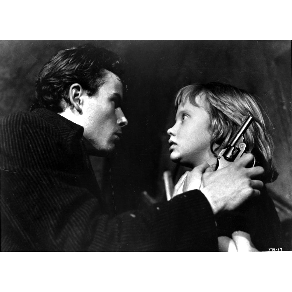 A film still of Hayley Mills and a male co star with a gun Photo Print Image 1