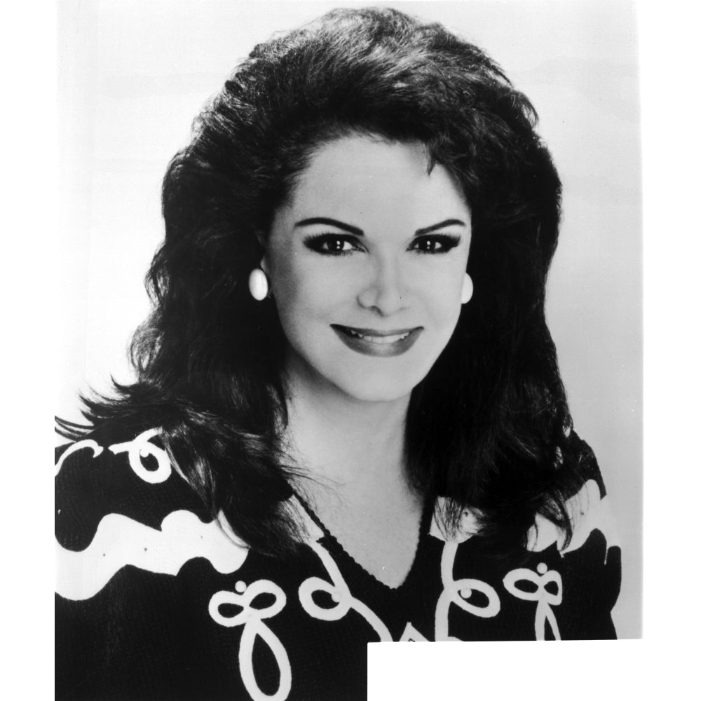 Connie Francis smiling in Black Print Dress with Pearl Earrings Photo Print Image 1