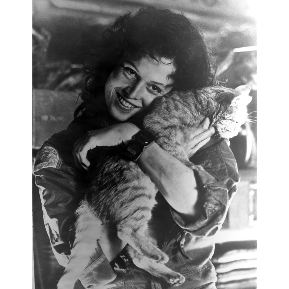 Sigourney Weaver Carrying Cat in Classic Photo Print Image 1