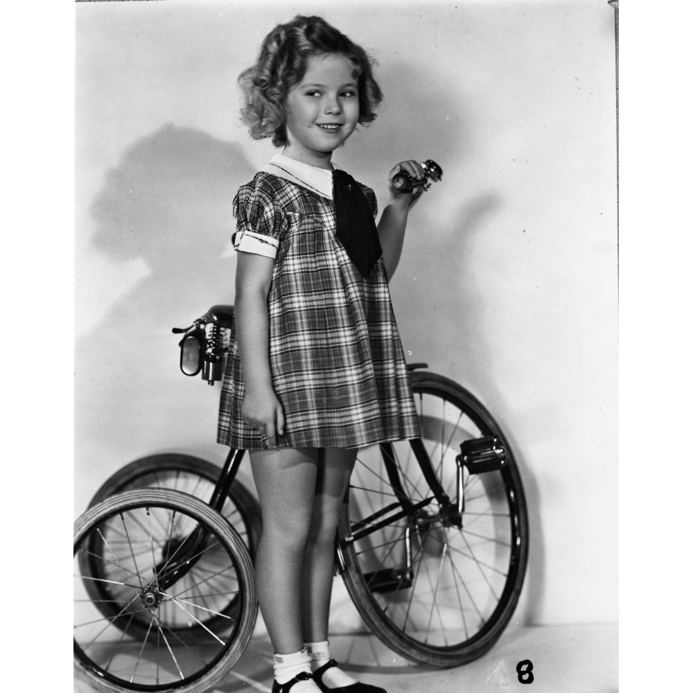 Shirley Temple holding her Tricylce bike Photo Print Image 1