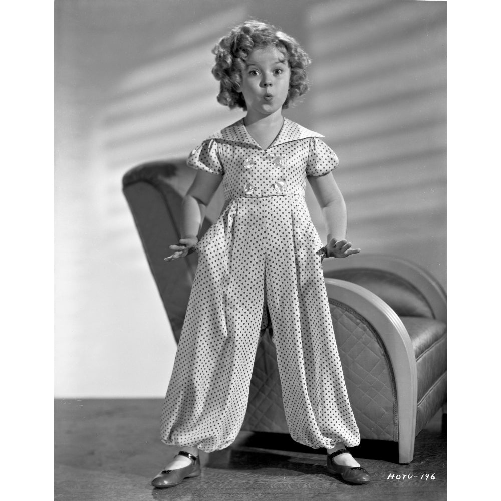 Shirley Temple wearing a Shirtdress with Cap-Sleeve with Matching Pants in Classic Portrait Photo Print Image 1