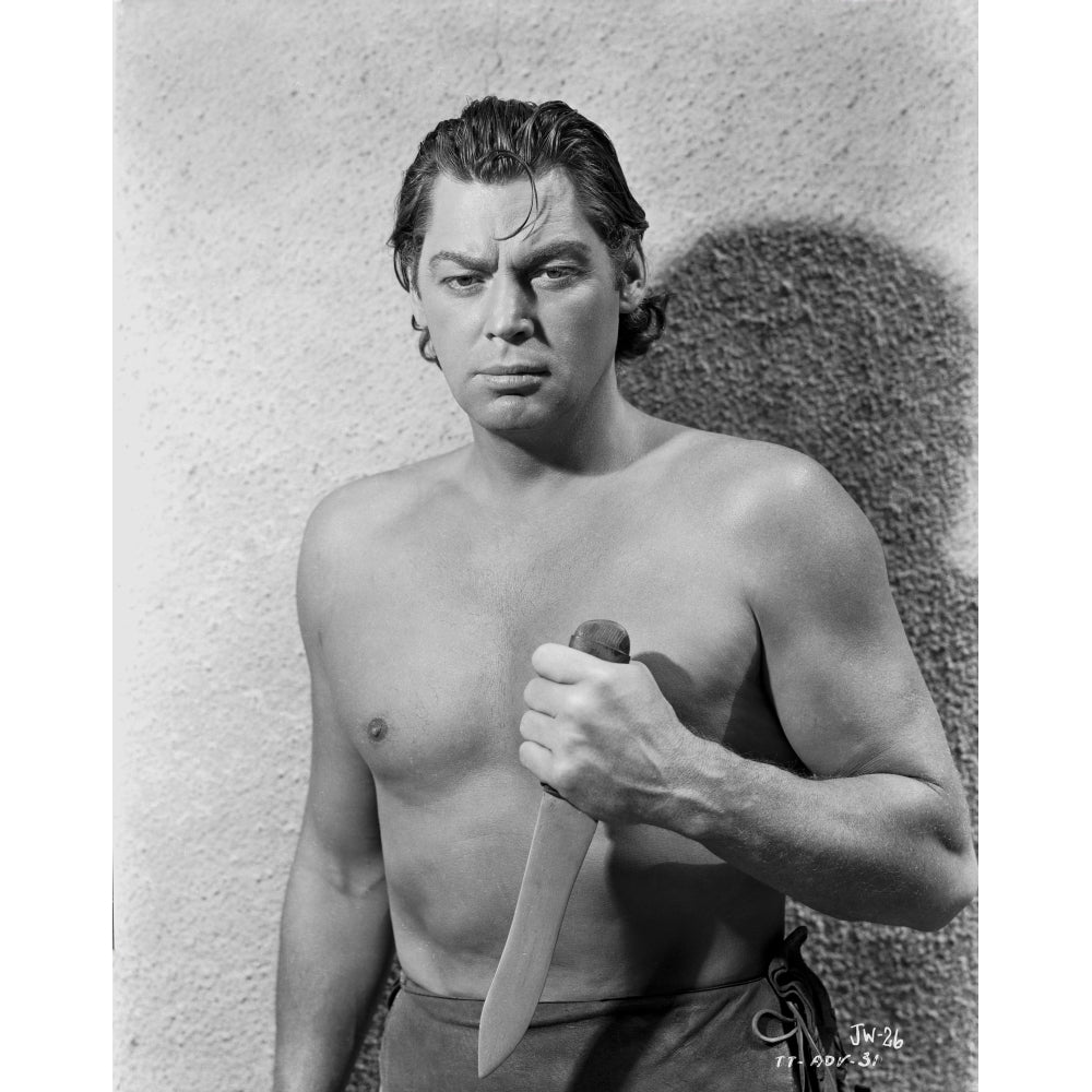 Johnny Weissmuller Holding a Knife in a Classic Movie Scene Photo Print Image 1