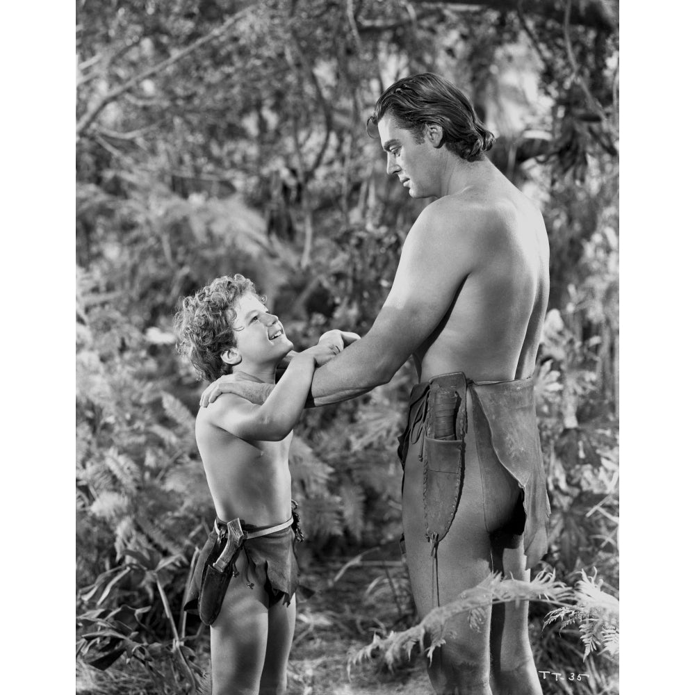 Johnny Weissmuller Having a Conversation with a Kid in a Movie Scene Photo Print Image 1