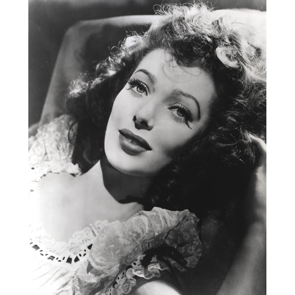 Loretta Young Portrait Lying with Curly Hair Photo Print Image 1