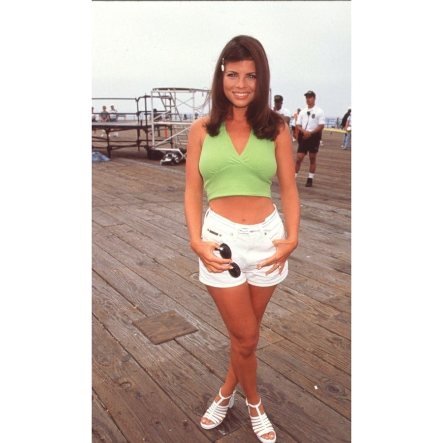 Yasmine Bleeth In White Shorts And Green Halter At Baywatch Filming Photo Print - Item CPA4355 Image 1