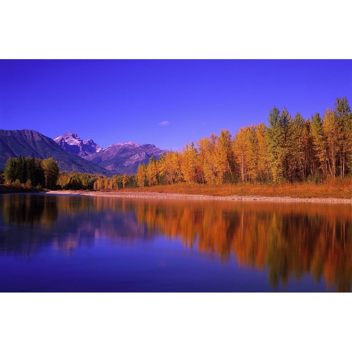 Elk River In Autumn With Three Sisters Mountain Range In The Background; Fernie British Columbia Canada Image 1