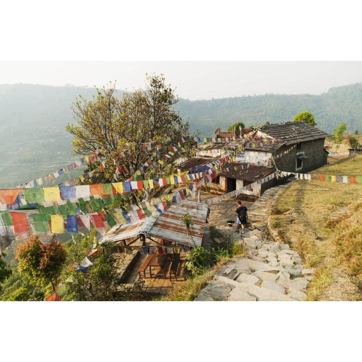 Annapurnas route in Nepal through Gandruk village a Tibetan house decorated with their traditional 5 colors Tibetan fla Image 1