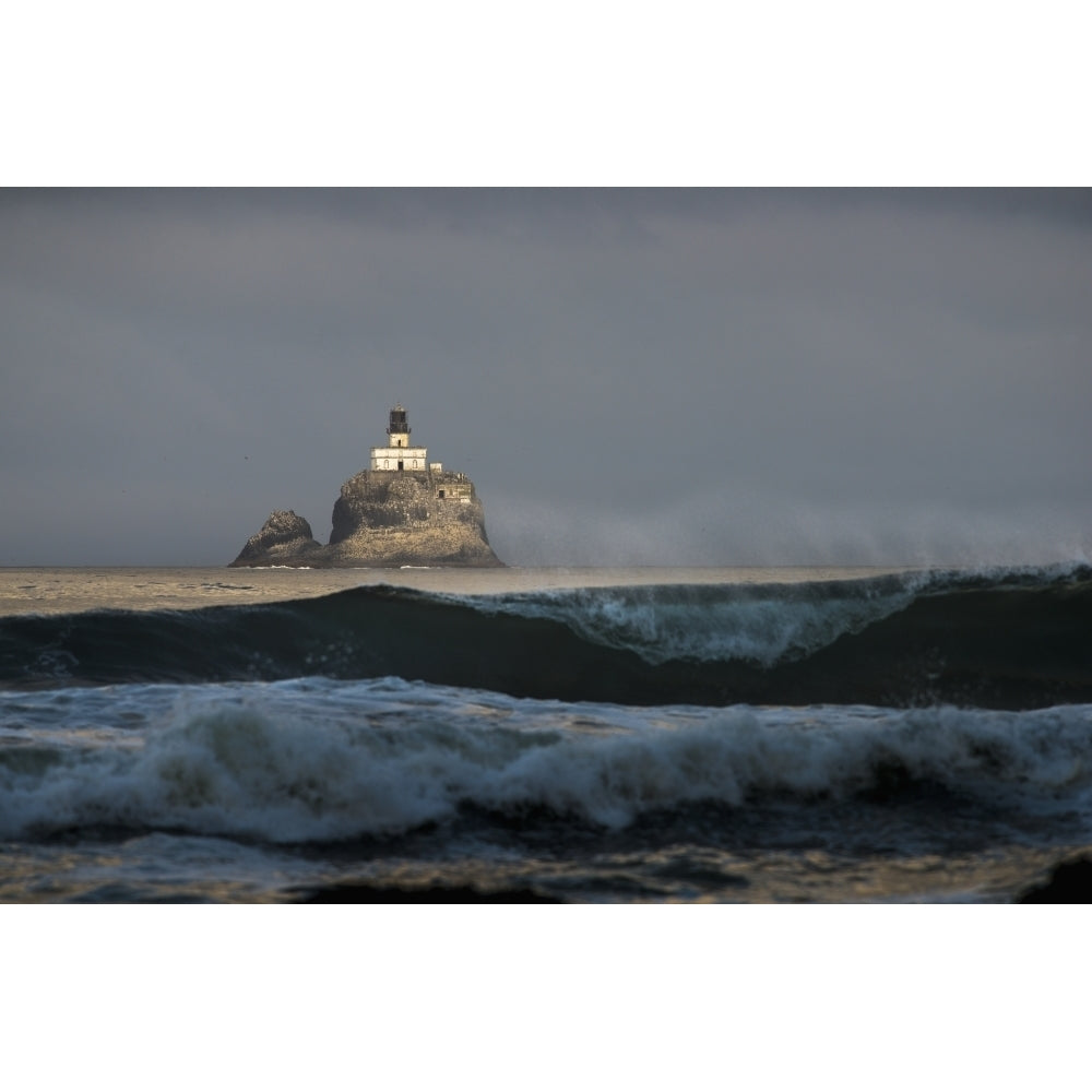 Early sunlight illuminates the old Tillamook Rock Lighthouse; Cannon Beach Oregon United States of America Poster Prin Image 1