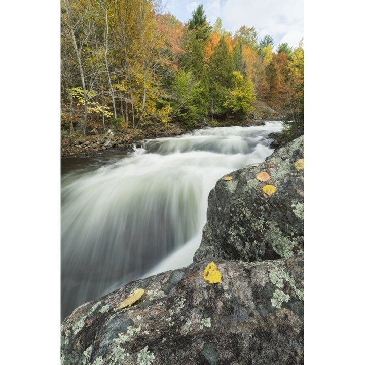 Long exposure of water flowing down Kawagama falls in the autumn near Dorset; Ontario Canada Poster Print Image 1