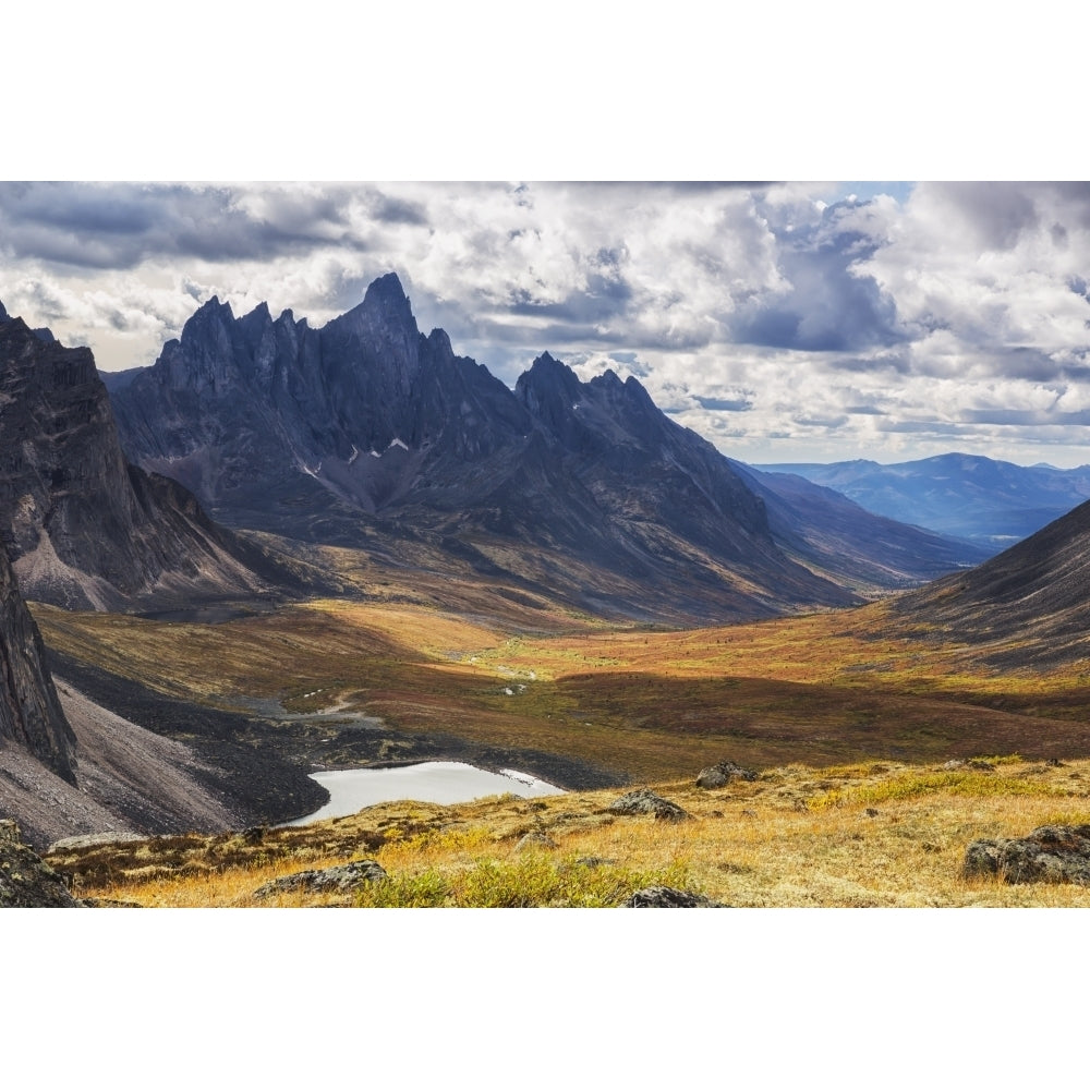 In the Yukons North country Tombstone mountain stands out above the tundra and Image 2