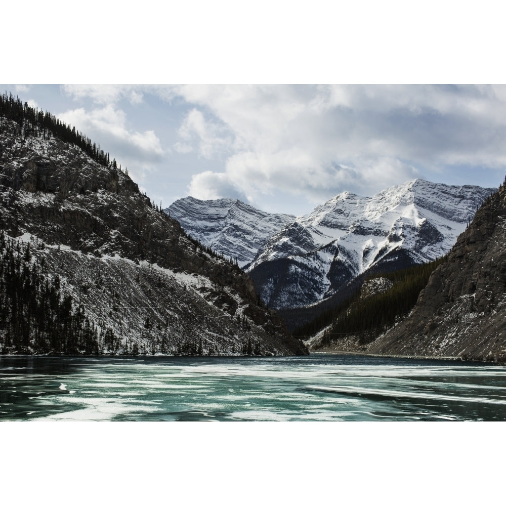 Mountains and frozen lake in winter Bow Valley Wildland; Alberta Canada Poster Print Image 1